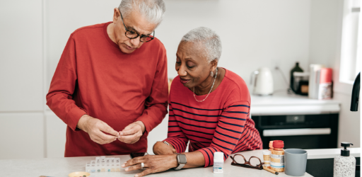 A patient and their spouse discussing cholesterol management