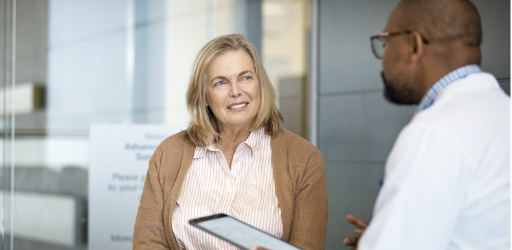 A patient speaking to their doctor about LIVALO®